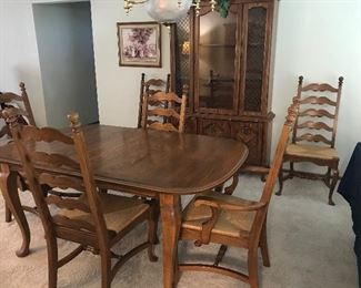 Solid Oak Table with 2 arm chairs, 4 side chairs, 2 leaves. Ladder Back.  Temple Stewart.  China Hutch is sold separately.