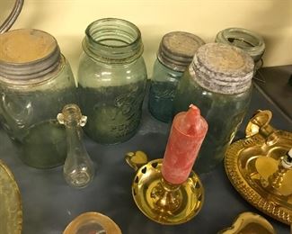 Candles, blue canning jars, brass. etc.
