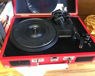 Love this little portable record player.  Like new