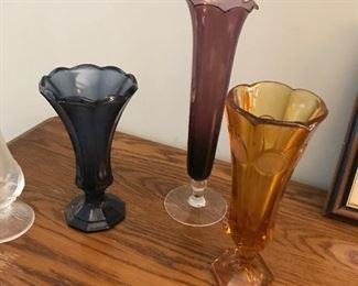 Love these vases, coin amble glass, amethyst and dark blue