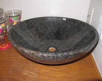 Polished stone sink