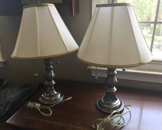 Pair of candlestick lamps.