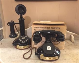 Jim Beam decanters in the shape of telephones.