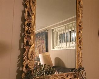 Carved wooden mirror.