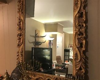 Wood carved mirror.