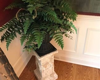 Potted plant on pedestal 