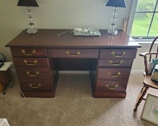 Great at-home office desk! Durable wood-look top. Lots of drawer space. 54 x 24 x 30  $125