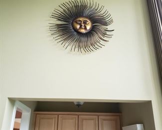 Sunburst wall art, this is very high and large