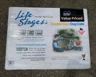 Midwest Life Stages Double Door dog crate, metal 		          NIB
Small: 	Dimensions: 25 3/8"L x 19¼"W x 20¾"H 		Mesh: 1½" x 4½" 		Wire Gauge: 3, 6, 7, 8, 11, 12 		Front Door Opening: 14 1/8"W x 13 7/8"H 		    Side Door Opening: 11¼"W x 13 7/8"H  		Suggested Breeds: Boston Terrier, Chihuahua, 			Shih Tzu, Pug, dogs 11-25 lb.
$25