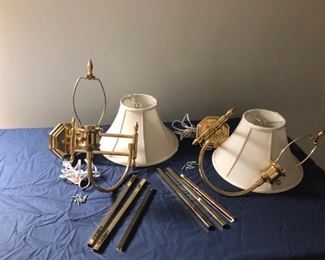 Pair brass wall mount swing arm sconces, plug into outlet; 23 in long when fully extended and 17 in high including the finial; come with covers for the cords (possibly could be hardwired?)    Asking $80 the pair
