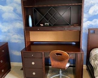 DESK WITH HUTCH BY YOUNG AMERICA 
52”L x 24”D x 75”H 
$140