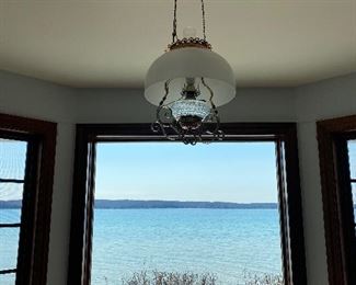 Antique electrified hanging kerosene lamp.  We will take down for you!