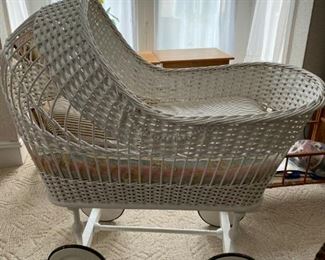 Antique wicker pram, crib, bassinet