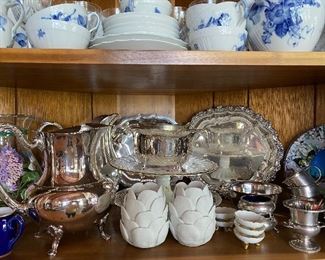 Royal Copenhagen "Blue Flower" dishes and sterling silver serving pieces as well as silver plate serving pieces
