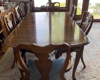 Beautiful Queen Anne dining table with 8 chairs
