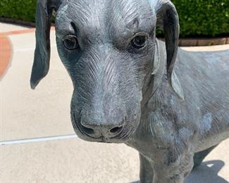 $1,000 life size bronze dog.  Artist unknown. 