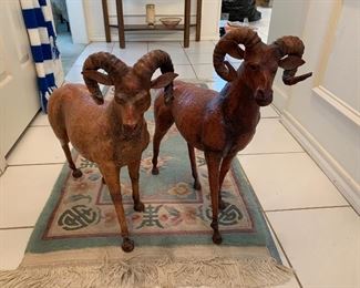 $300 - Two wood rams with leather ears.  Approx 20" tall each.  Origin unknown but in great condition.
