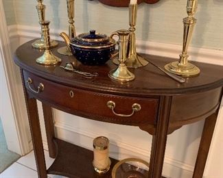 $175 - Hekman half moon foyer table 