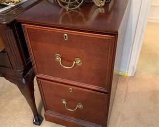 $80 - two drawer wooden file cabinet