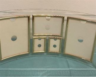 Assorted Sizes of Pictures in One Glass Frame