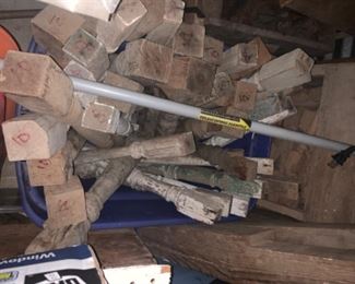 Old front porch spindles...lots of them and other house parts