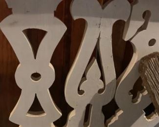 Several styles of unpainted old stock of bannister panels