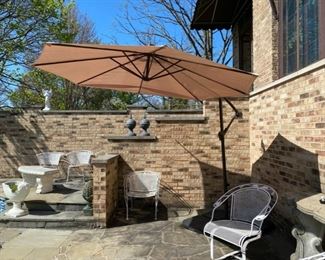 Patio umbrella 85.00 (one of the support rods pokes through fabric)