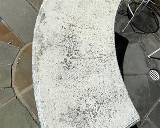 top of curved garden bench