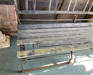 missing piece on iron and wood bench