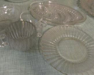Lot 68 - Large lot of glass serving plates, bowls, glass butter dishes, candy dish Etc.  next pic is part of this lot $25.00                                                                             