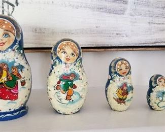 LOT S89 - $40 - FIVE PIECE RUSSIAN NESTING DOLLS (LARGEST DOLL IS 6 1/4")