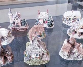 LOT S120 - $65 - NINE PIECE CHRISTMAS COTTAGES, ONE IS MUSICAL