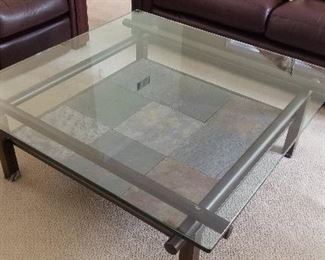 LOT F26 - $195 - SQUARE METAL AND GLASS TABLE 