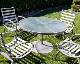 LOT F44 - $550 - FIVE PIECE PATIO SET - ROUND TABLE IS 4' IN DIAMETER, CHAIRS ARE 2' X 29" X 35"