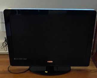 T.V., on Floor Approximate Size 26" VIZIO