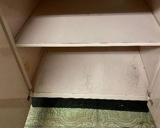 18. Inside the Pink Metal Cabinet