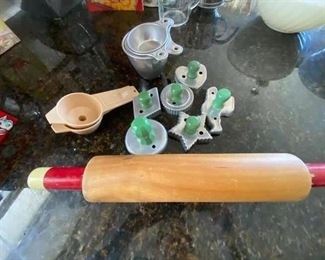 62. Vintage Rolling Pin, Cookie Cutters with Measuring Cups $8