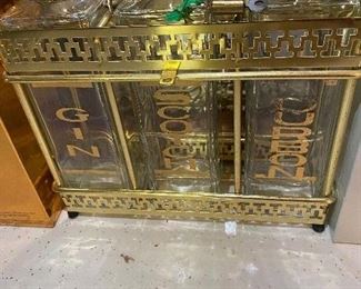 110. Vintage Gin Scotch Bourbon Bottles in Caddy $45