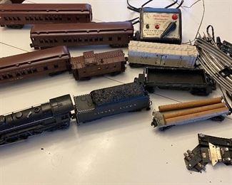 12. Post War. Lionel 1945-1947. This is I know mix matched set.But I am not separating Passenger Cars #2625.. Engine has 4 Windows.  3rd Largest Engine that Lionel Built. Set comes with Tracks, Transformer and freight set. Stack on Caboose is off. SET $710.00