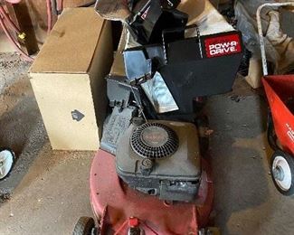 343. Toro Lawn Mower with Attachments $70. 