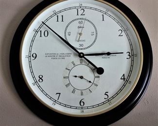Large wall clock is perfect for den or office.
