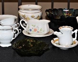 A collection of fine china and glassware.