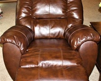 Oversized and very comfortable faux leather recliner.