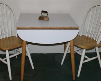 Cute drop leaf table with matching chairs.  Perfect for your morning coffee.