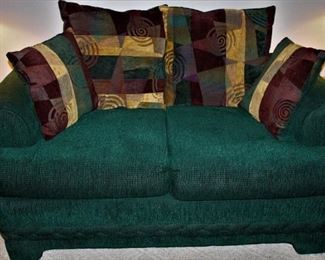 Two matching love seats.  Evergreen color and both are in great condition.   