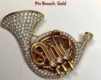 Lot 1027 SWAROVSKI Crystal Figural French Horn Pin Brooch. Gold 