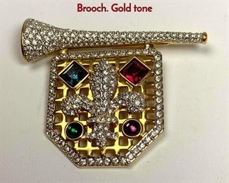 Lot 1028 SWAROVSKI Crystal Figural Trumpet Pin Brooch. Gold tone