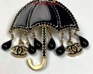 Lot 1037 CHANEL Enamel Crystal Umbrella Brooch Pin. Figural pin 
