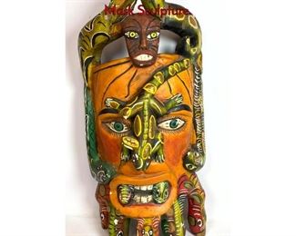 Lot 1299 Large South American Grotesque Wall Mask Sculpture.