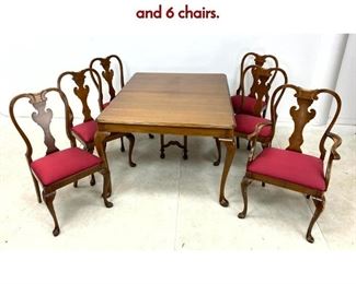 Lot 1323 Mahogany Queen Anne Dining Set. Table and 6 chairs.